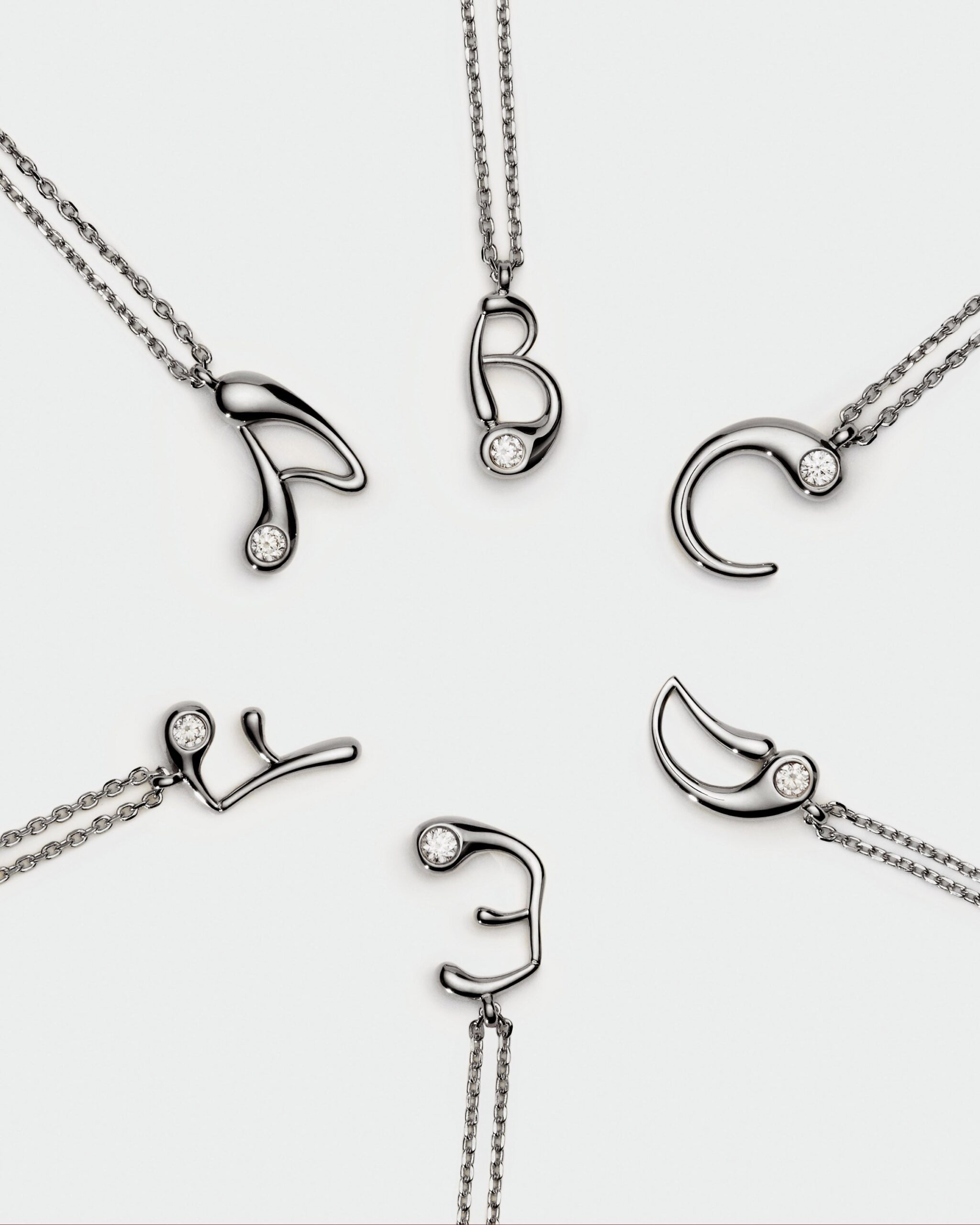 Initial silver pendant necklace
