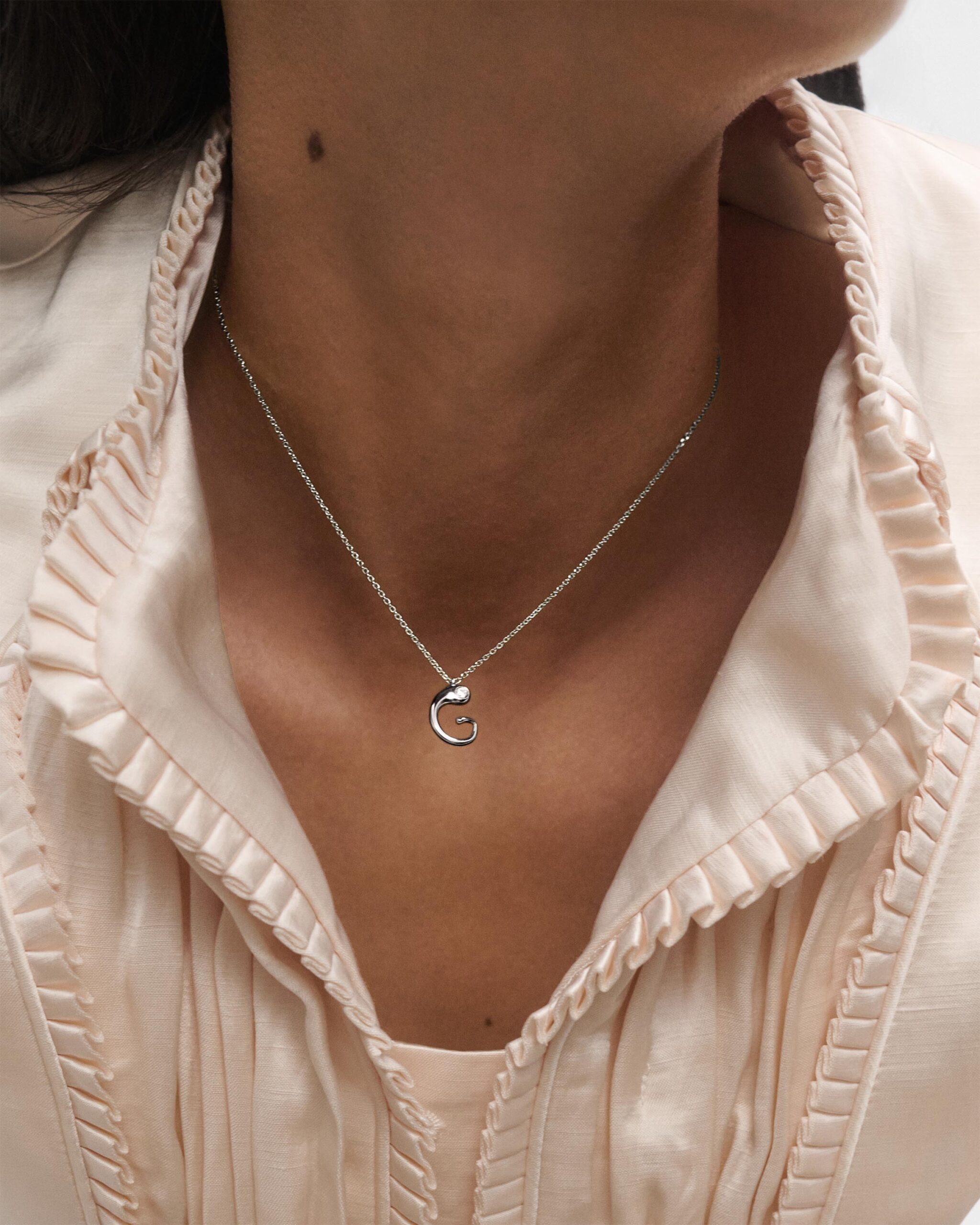 Initial silver pendant necklace