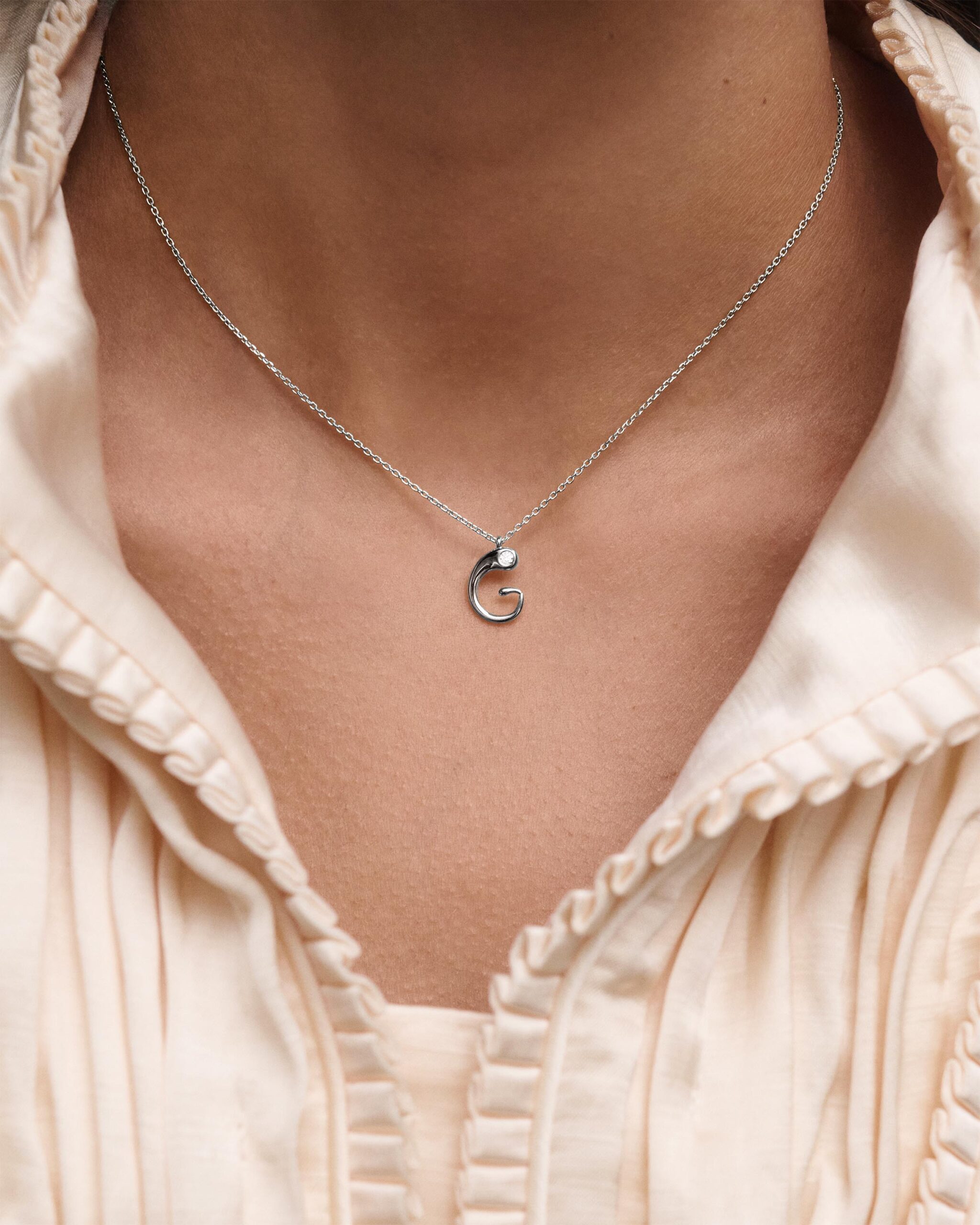 Initial silver pendant necklace