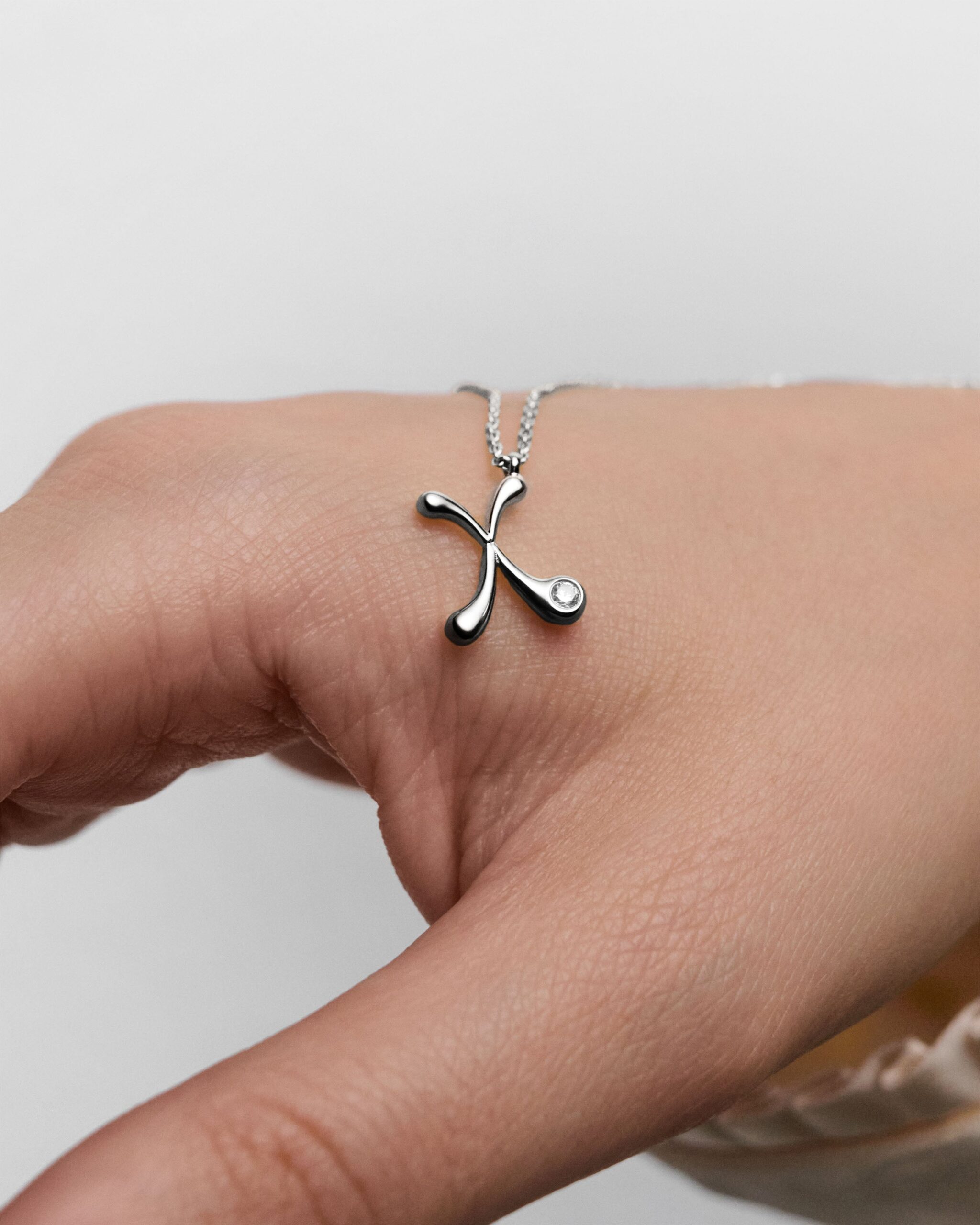 Initial silver pendant necklace