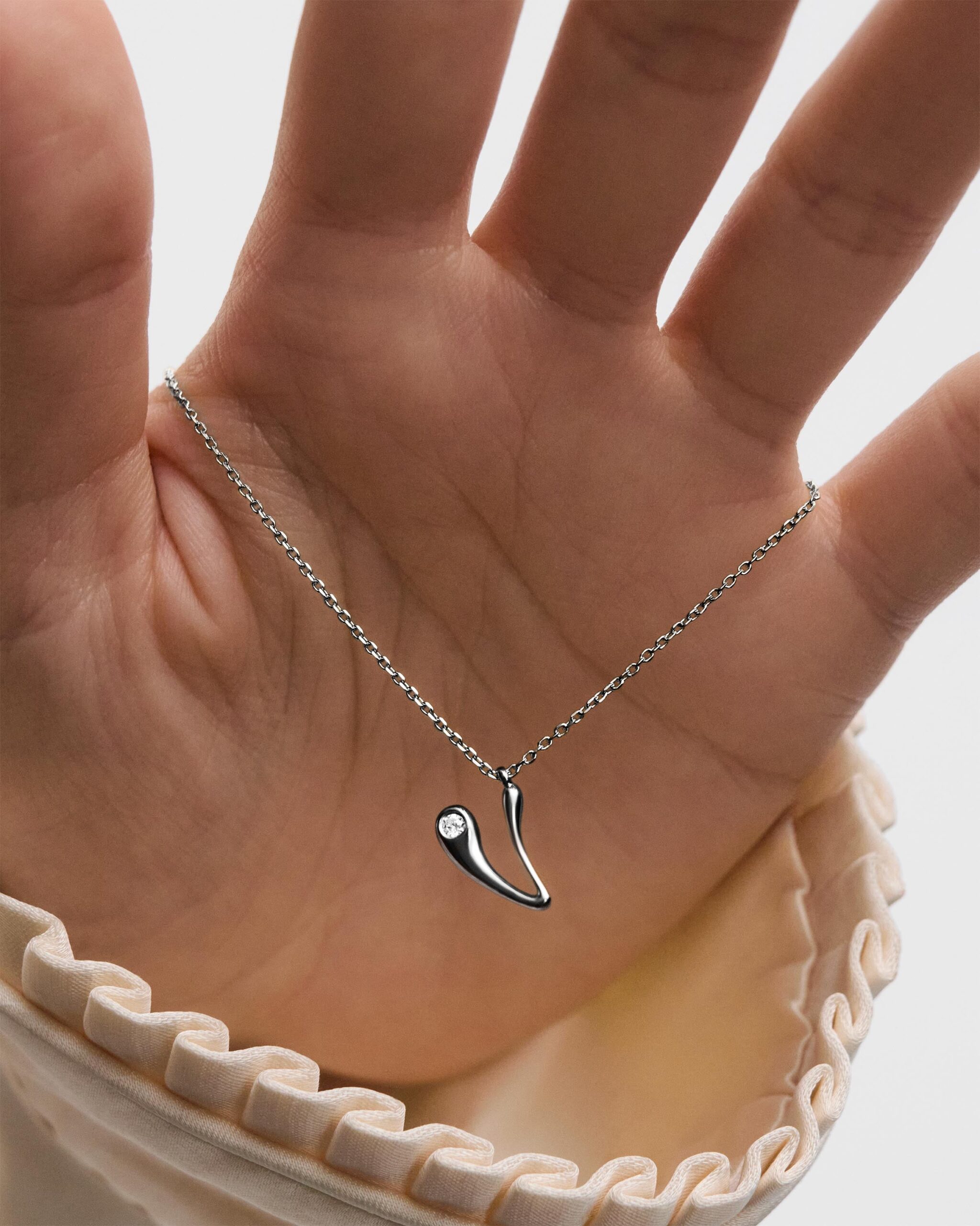 Initial silver pendant necklace