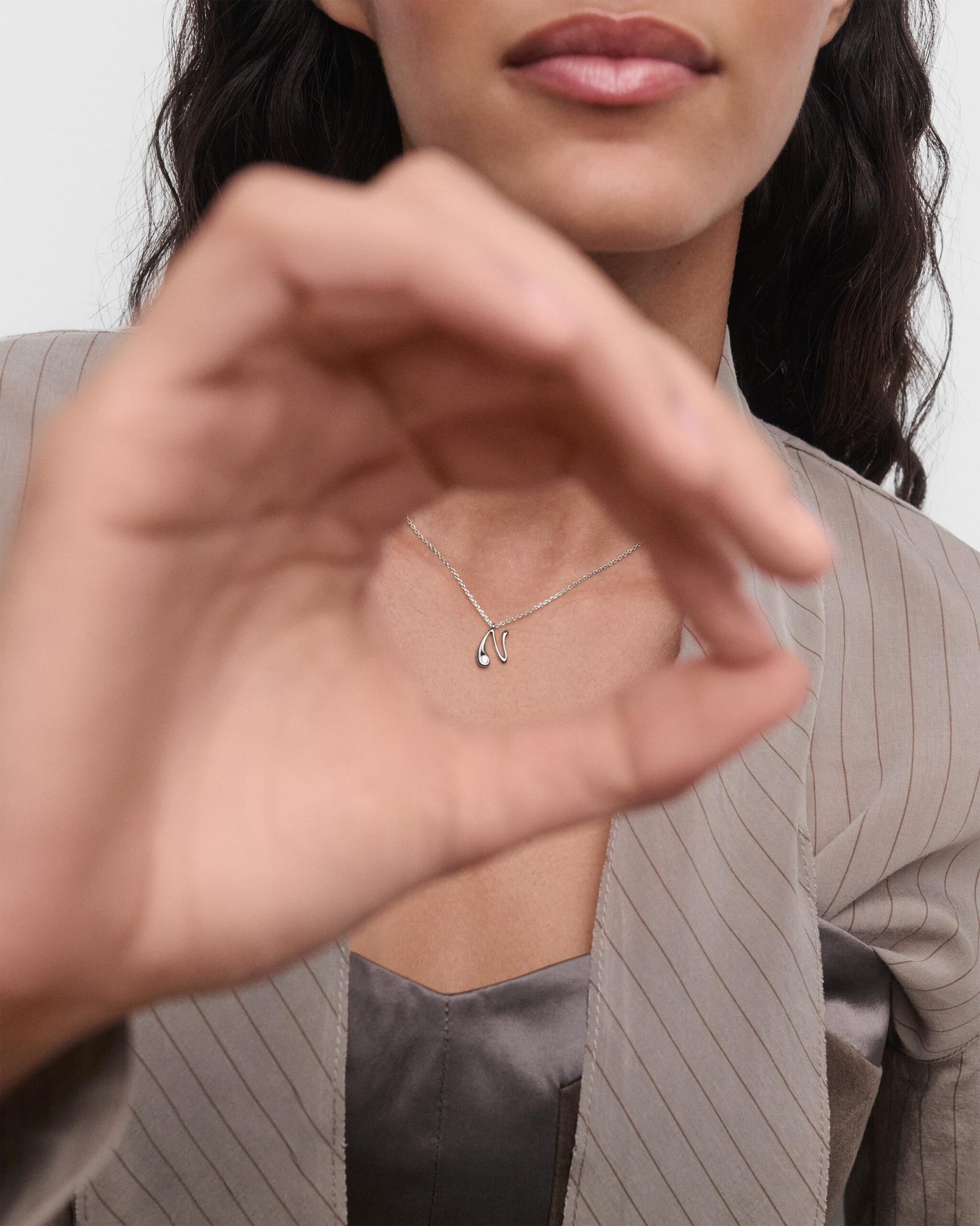 Initial silver pendant necklace