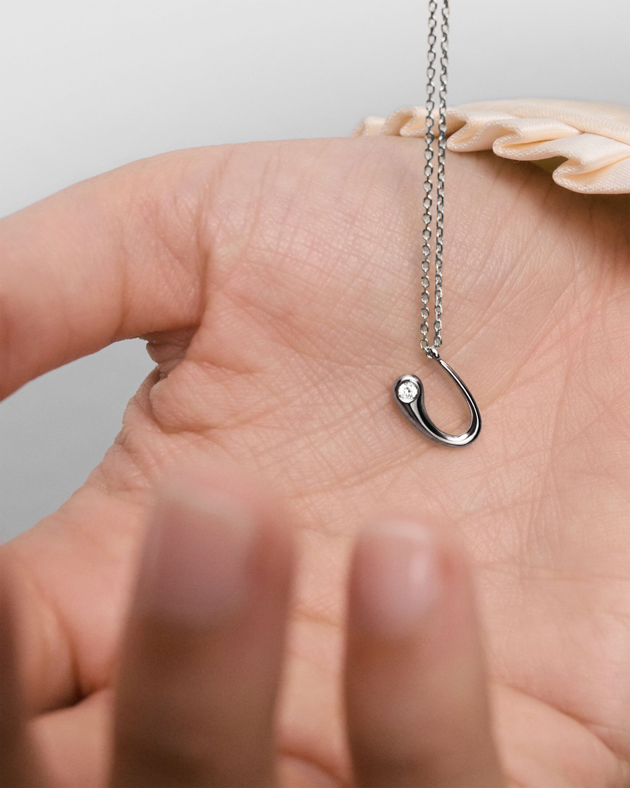 Initial silver pendant necklace