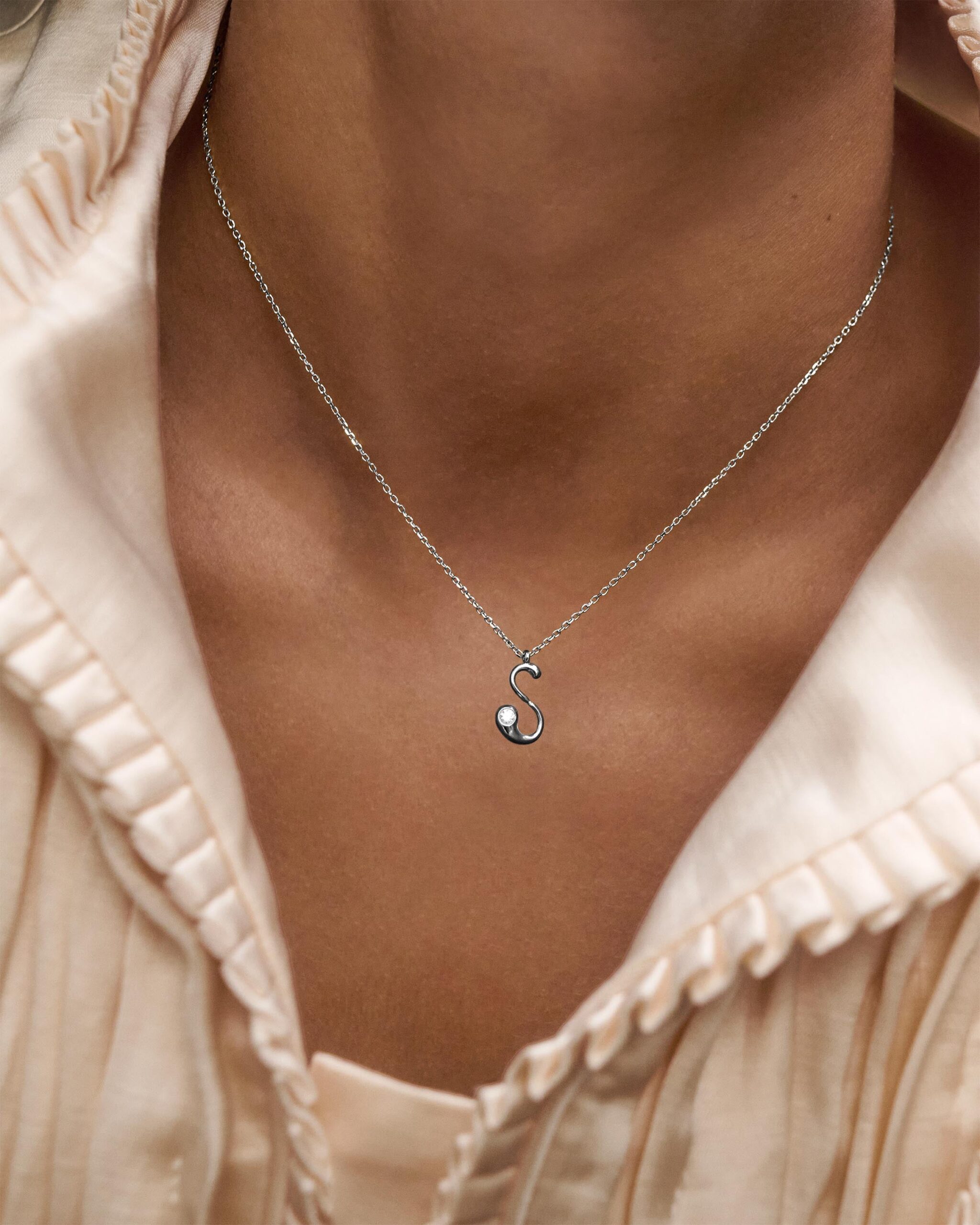 Initial silver pendant necklace