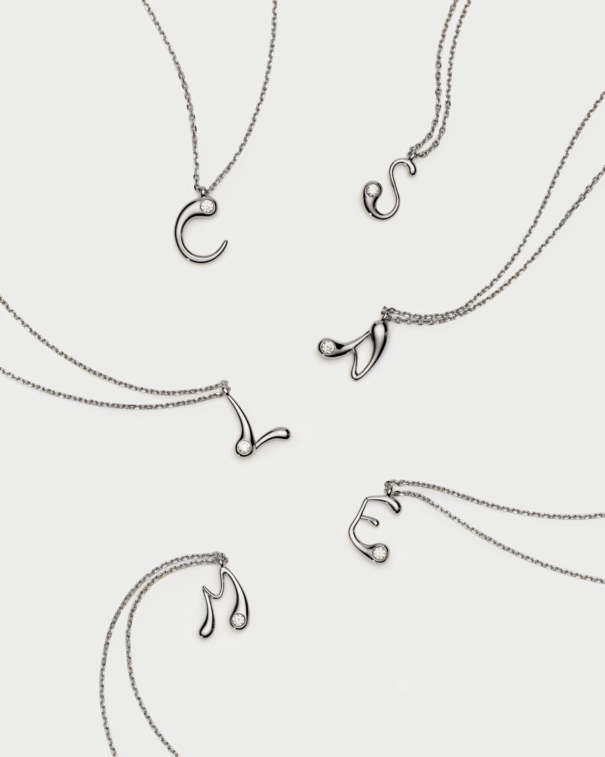 Initial silver pendant necklace