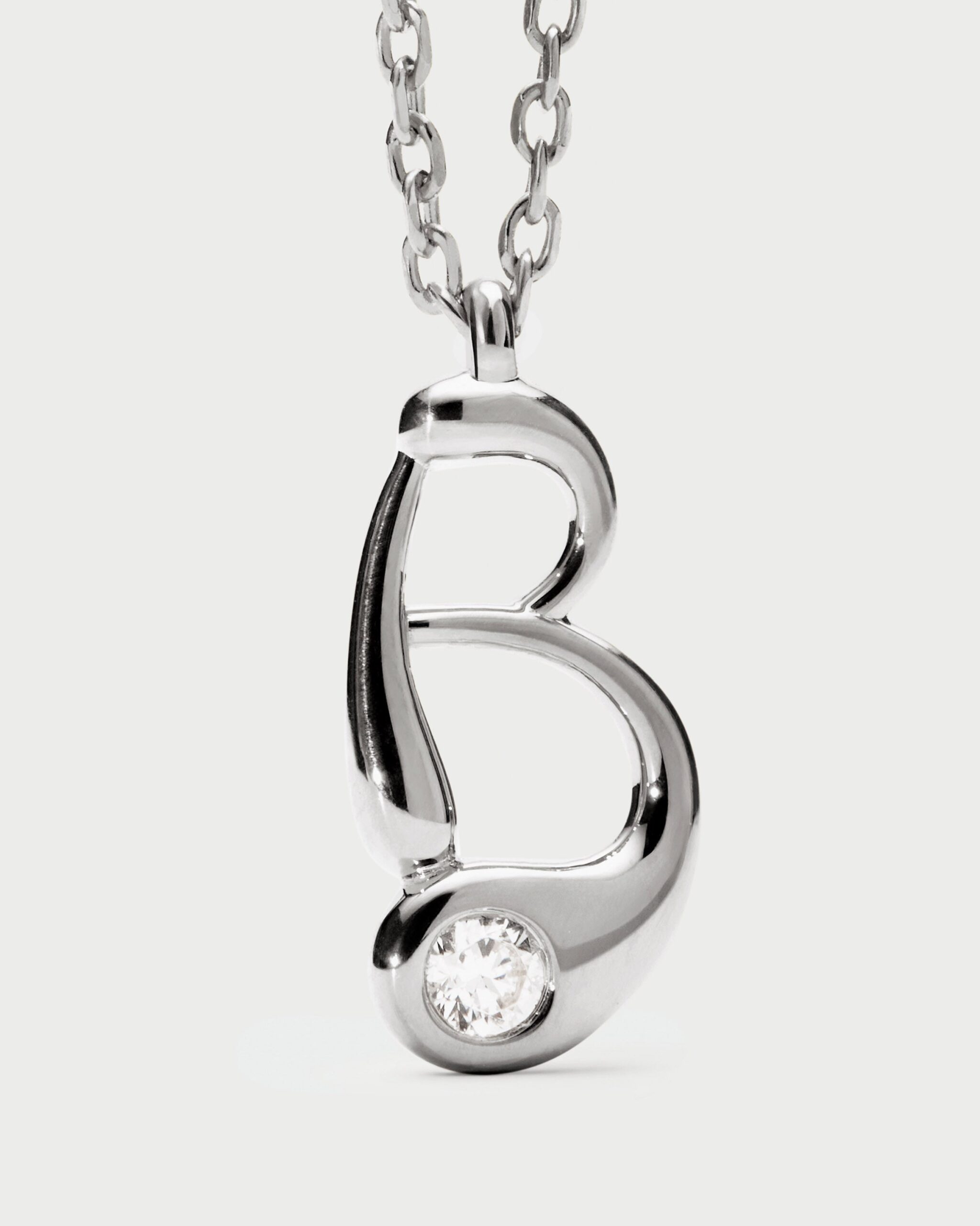 Initial silver pendant necklace
