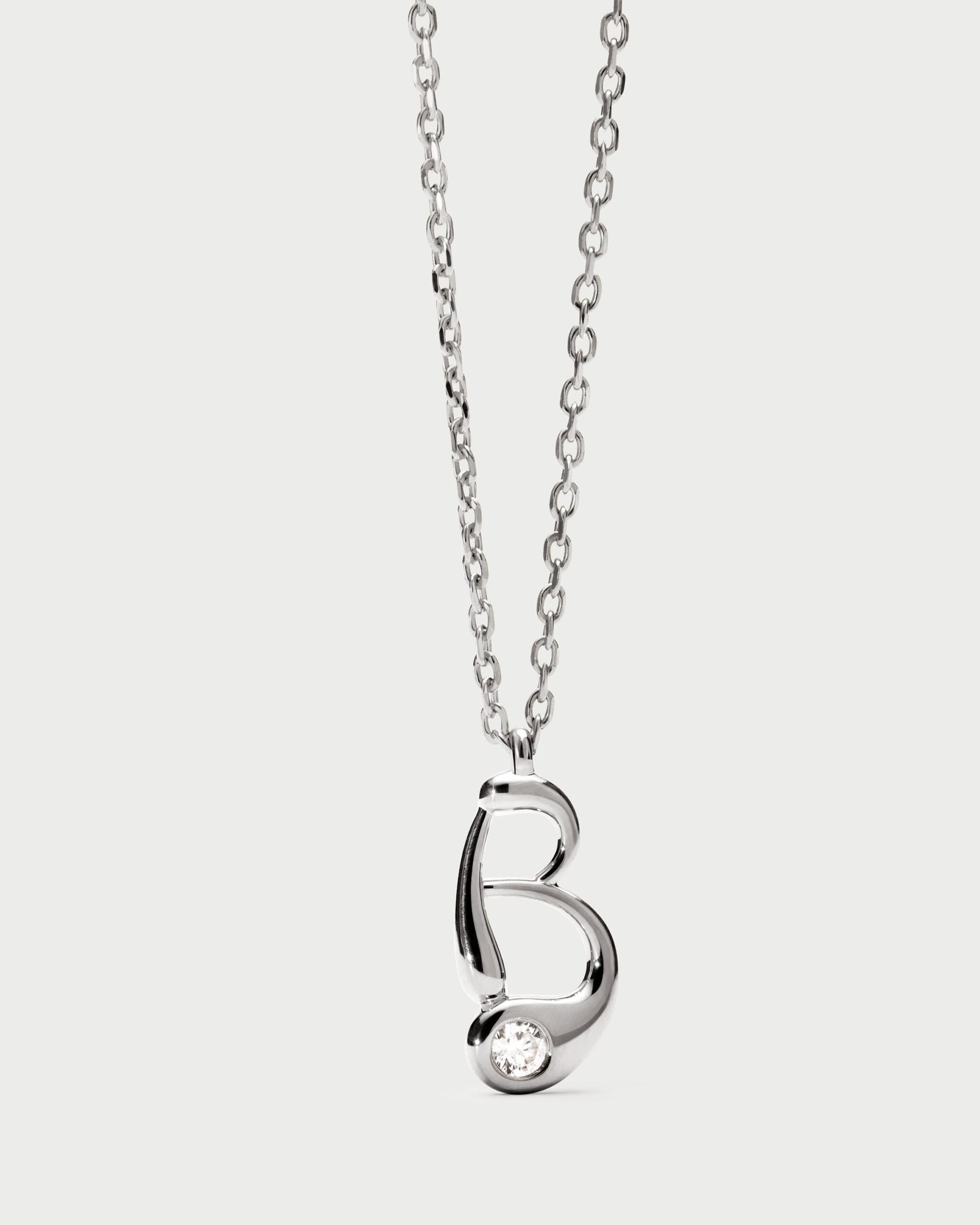 Initial silver pendant necklace
