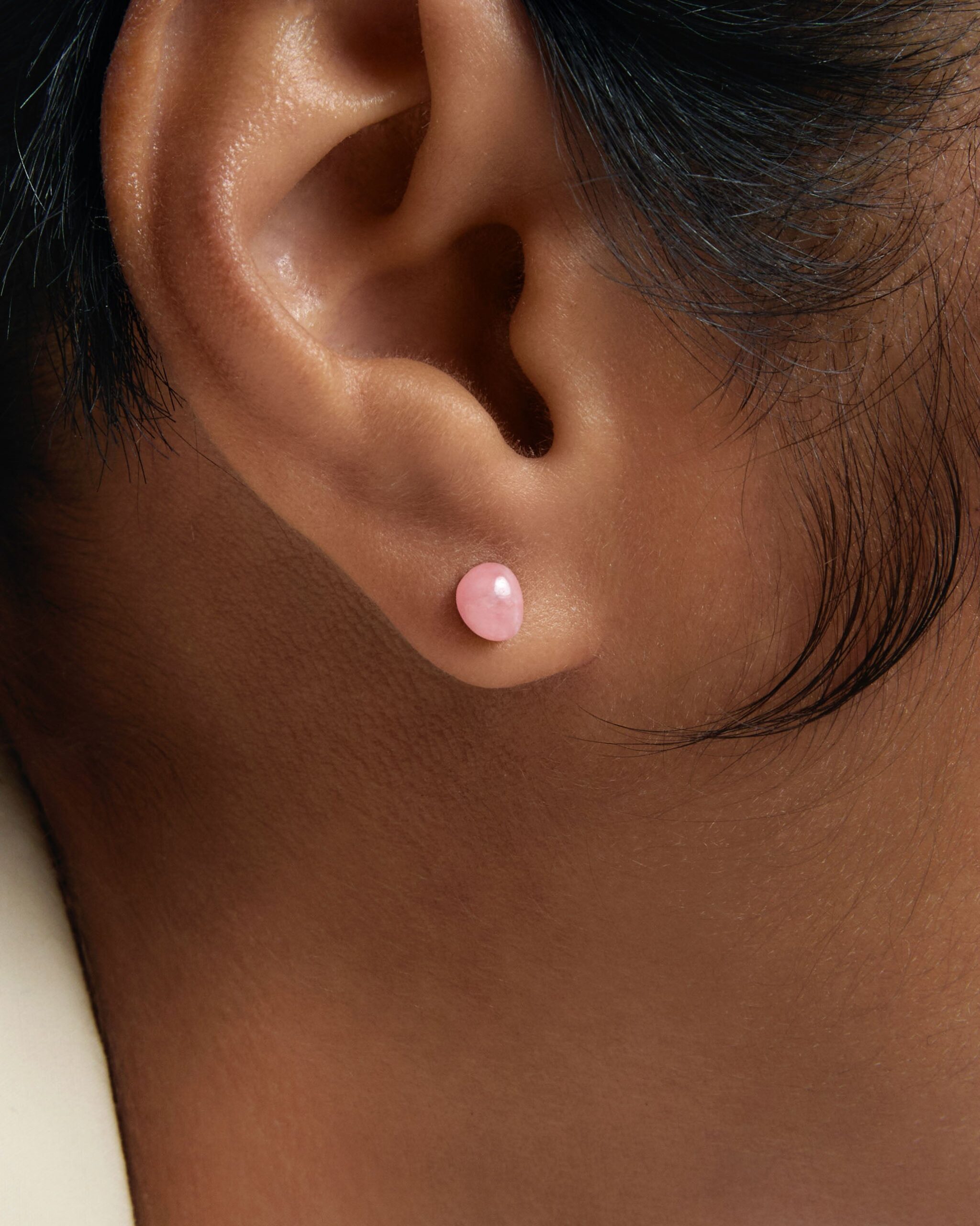 Gravity ear piercing