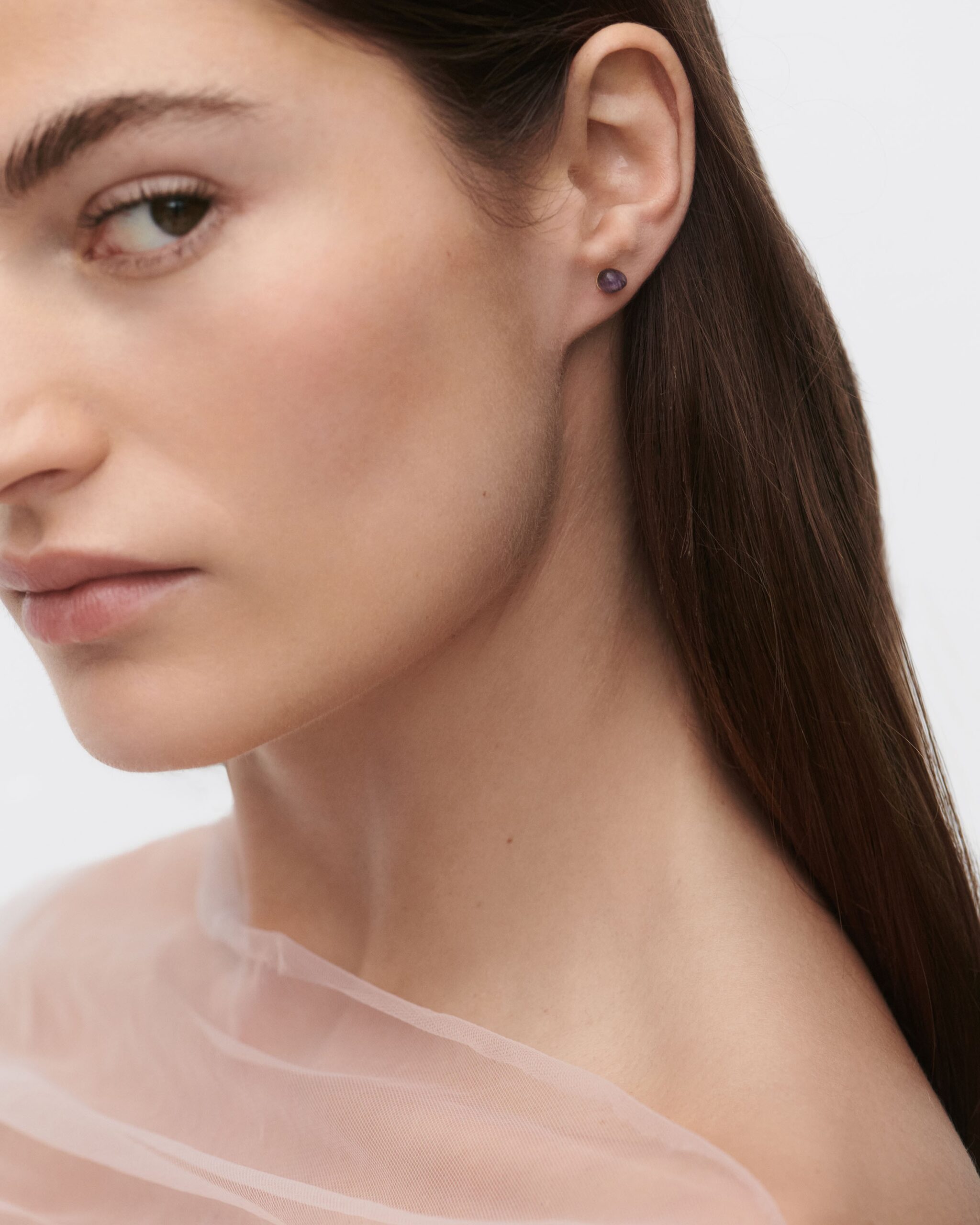 Gravity ear piercing