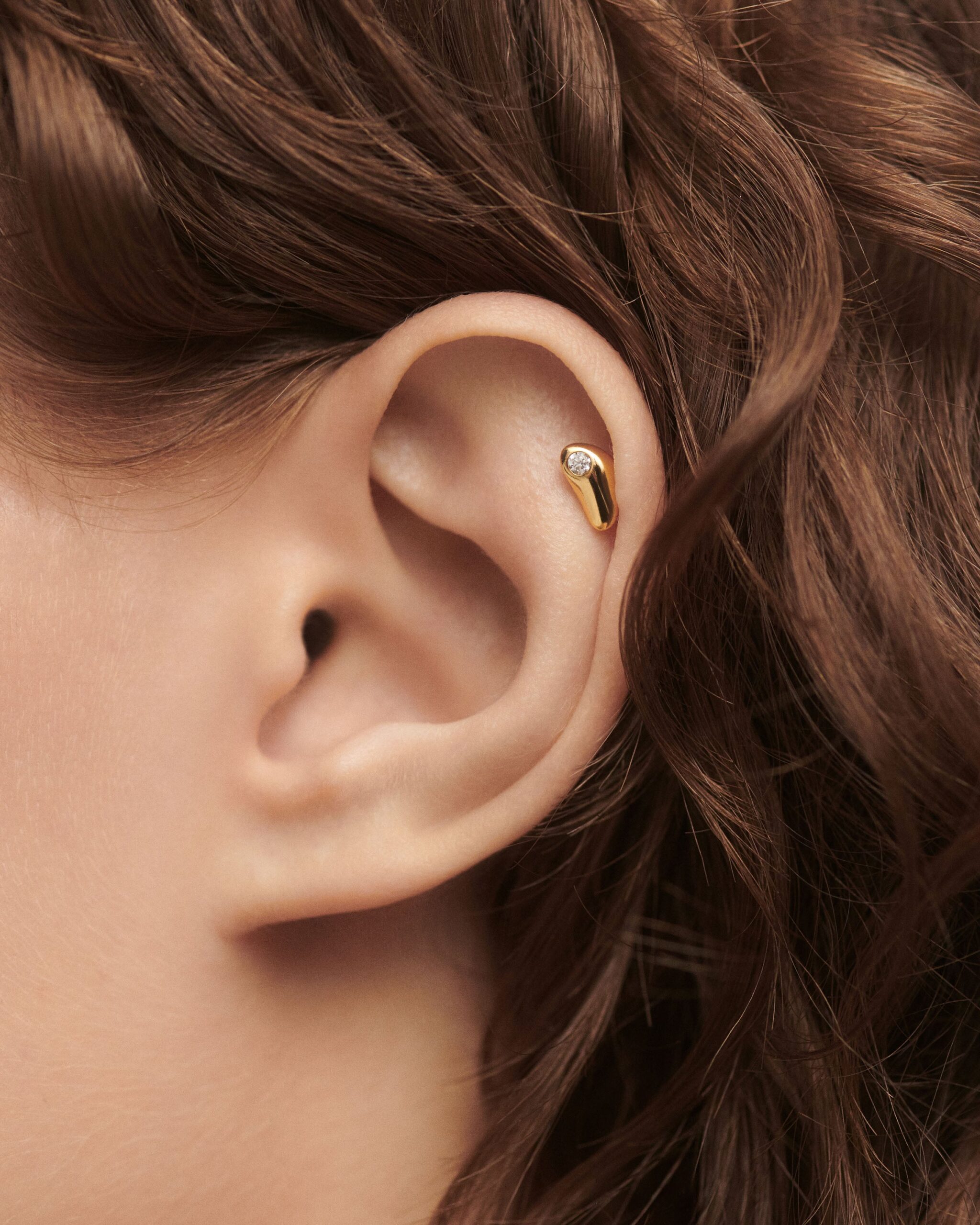 Delta single stud earring