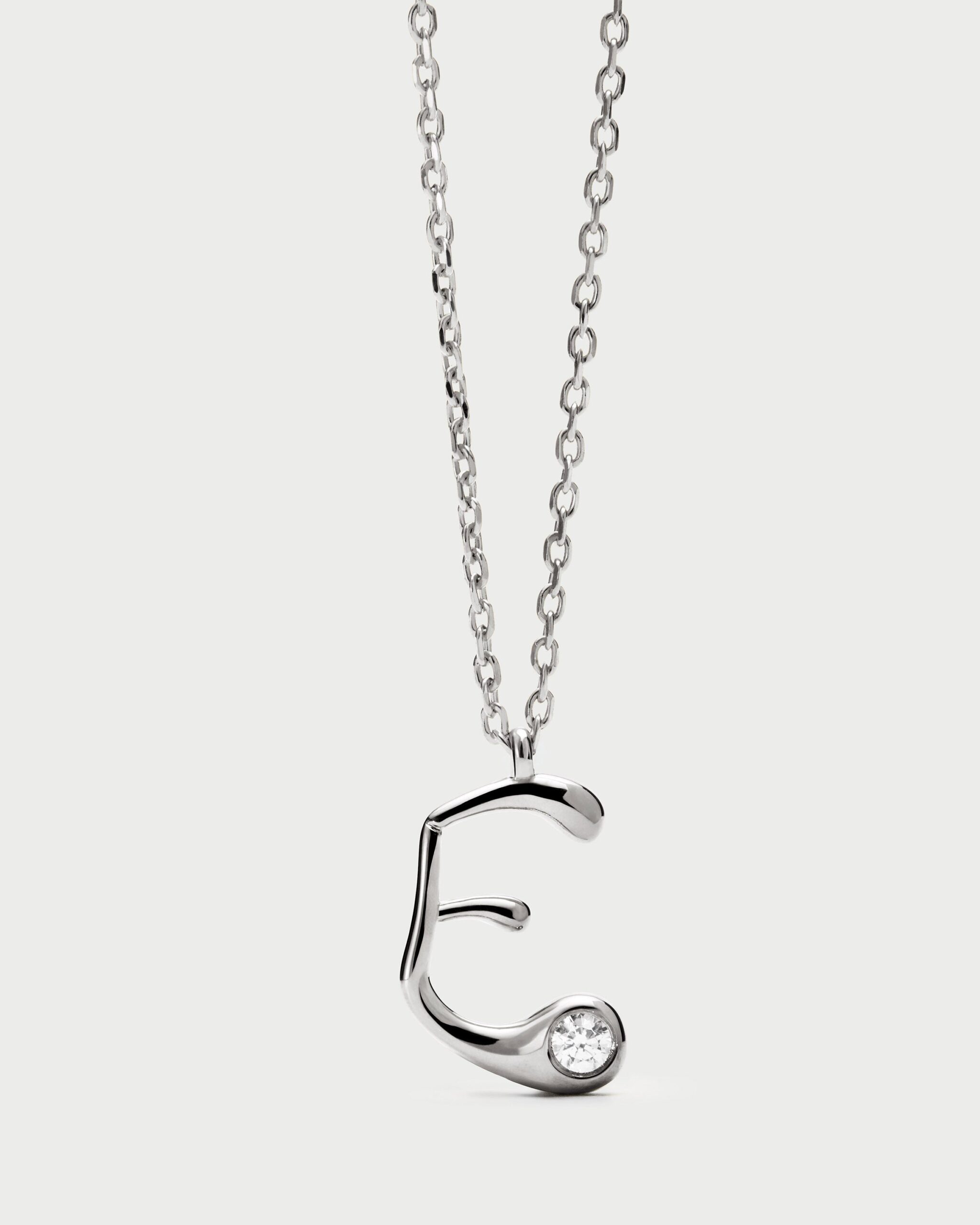 Initial silver pendant necklace