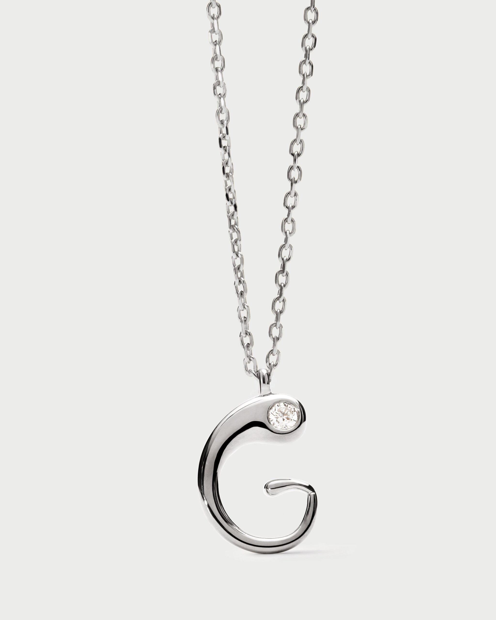 Initial silver pendant necklace