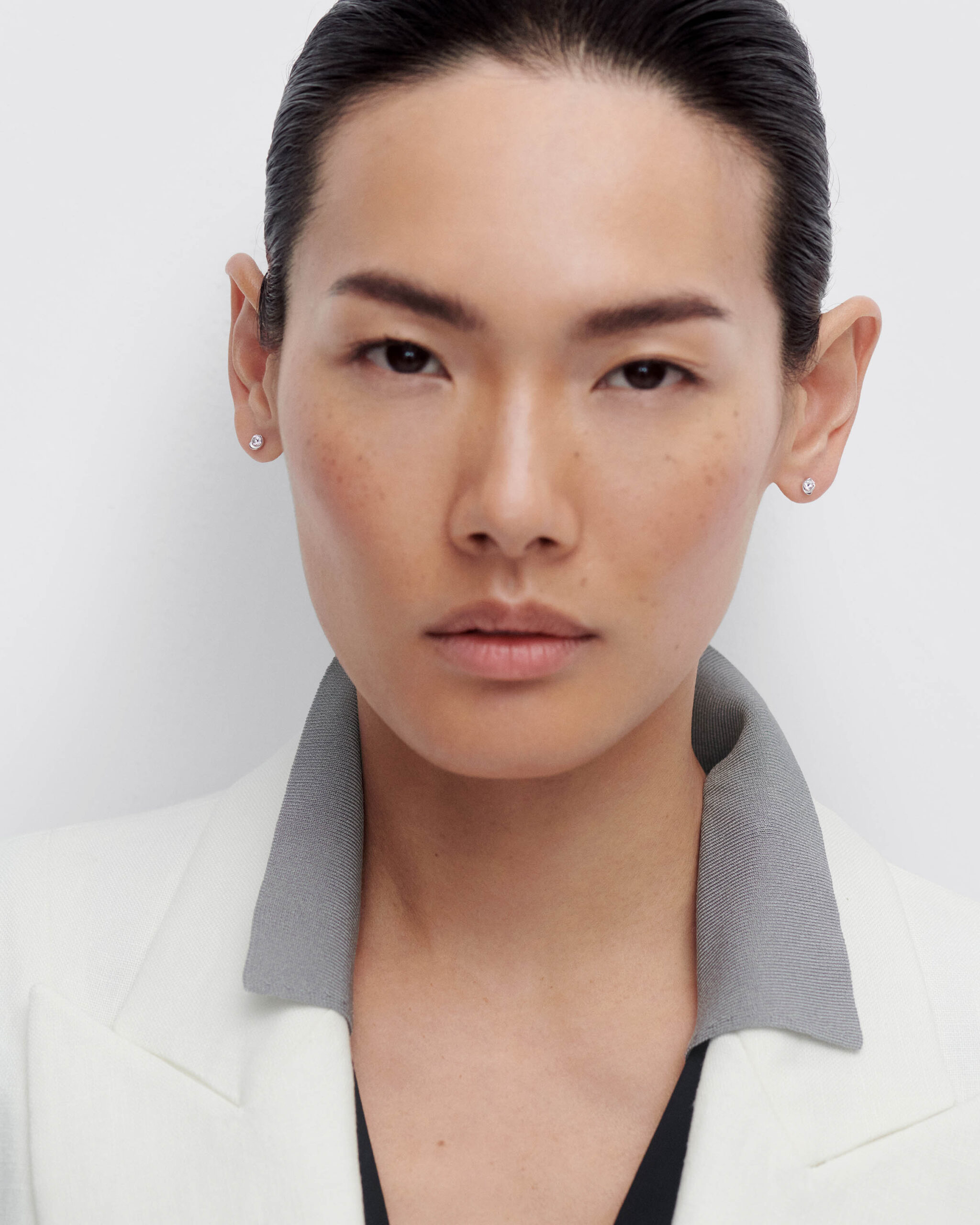 Diamonds and white gold delia stud earrings